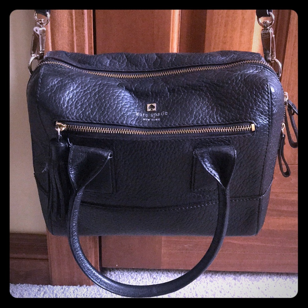 Black Kate Spade handbag. ♠️